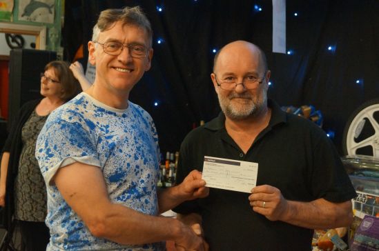 Lion President Phil (left) presents cheque to Joe for the Youth Club